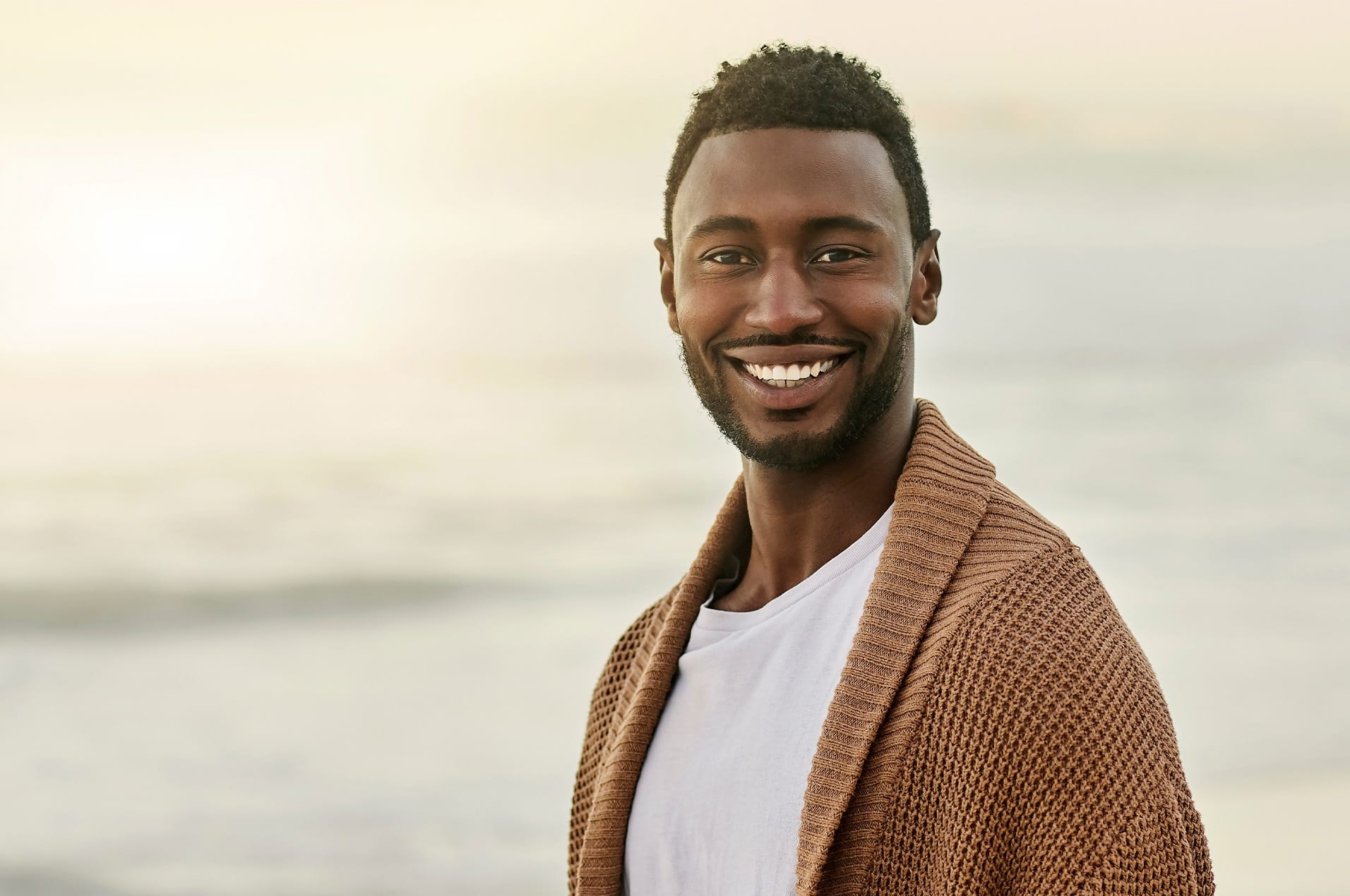 Man smiling during consultation
